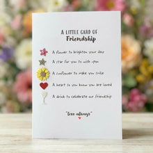 Load image into Gallery viewer, handmade friendship card with small decorative charms including flower, heart and star on kraft style card